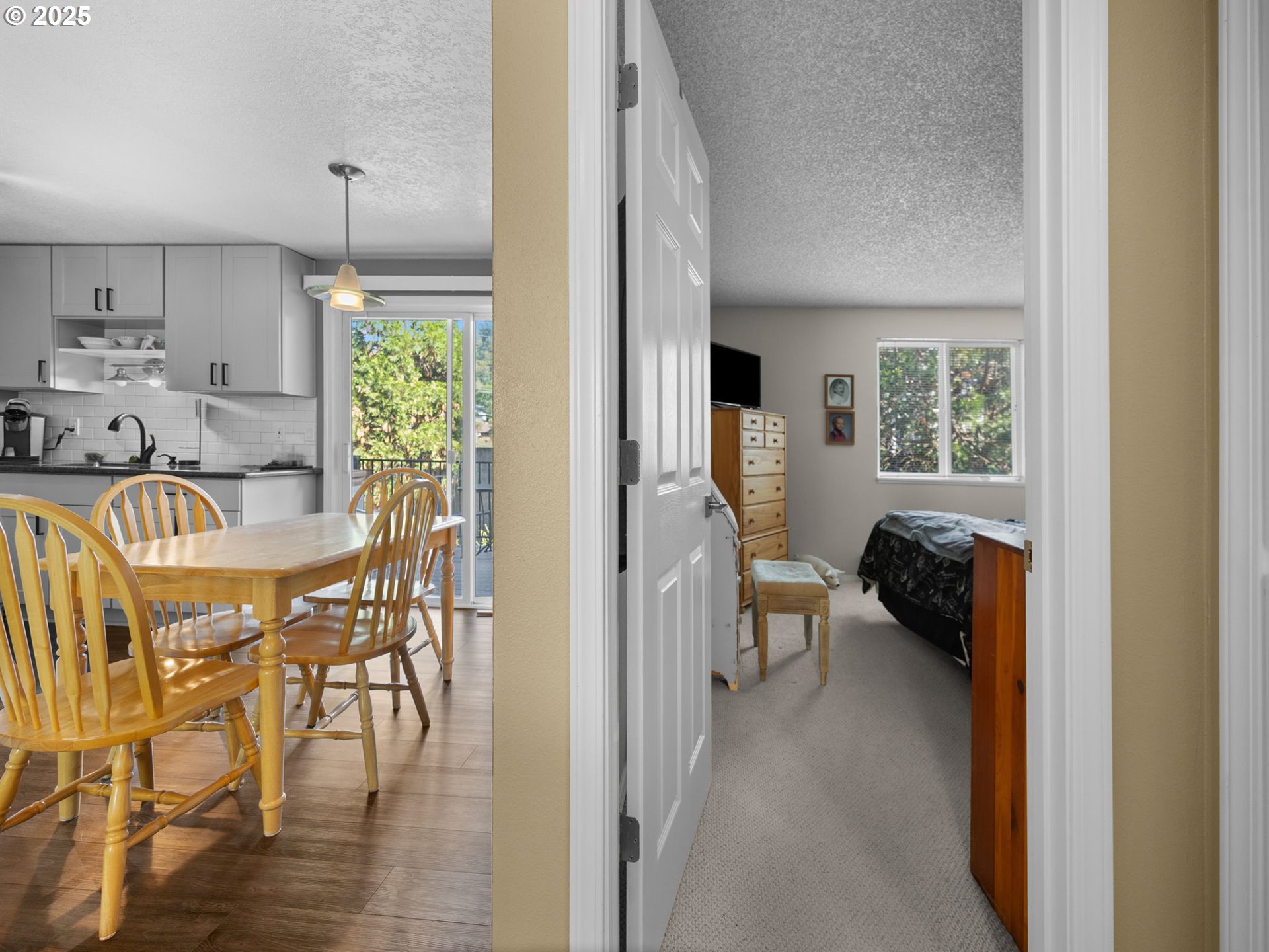 159 Southwest Florence Avenue, Unit 62 Gresham, OR 97080 - Photo 10 of 30 a view of a dining room with furniture window and wooden floor