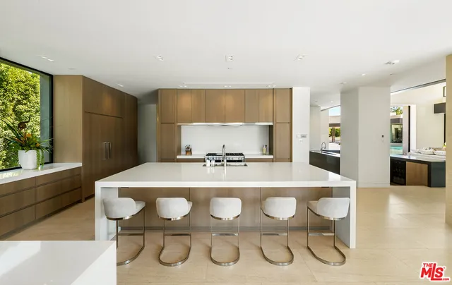 a living room with fireplace furniture and a flat screen tv