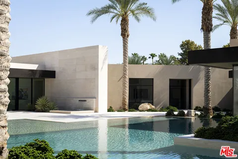 a view of living room with furniture and flat screen tv