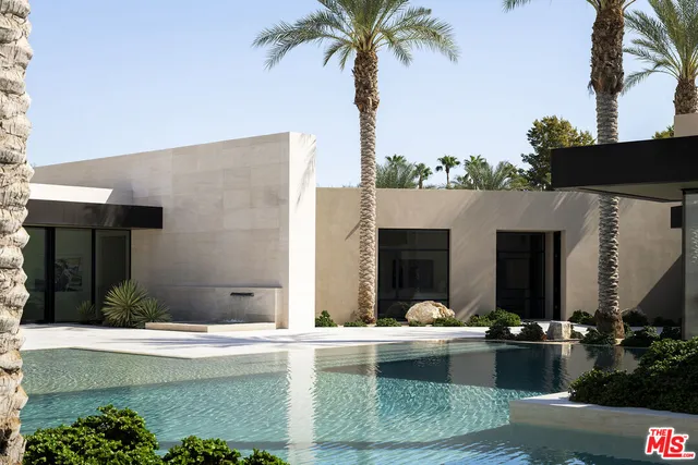 a view of living room with furniture and flat screen tv