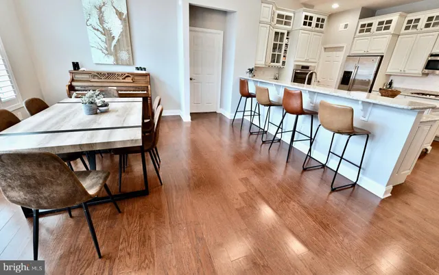 a workspace with furniture and wooden floor