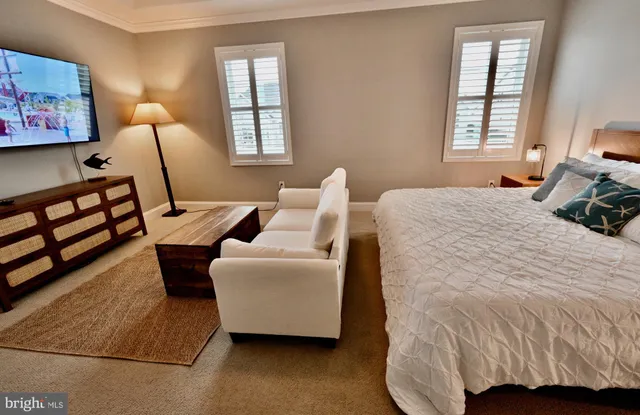 a bed room with a bed and a window