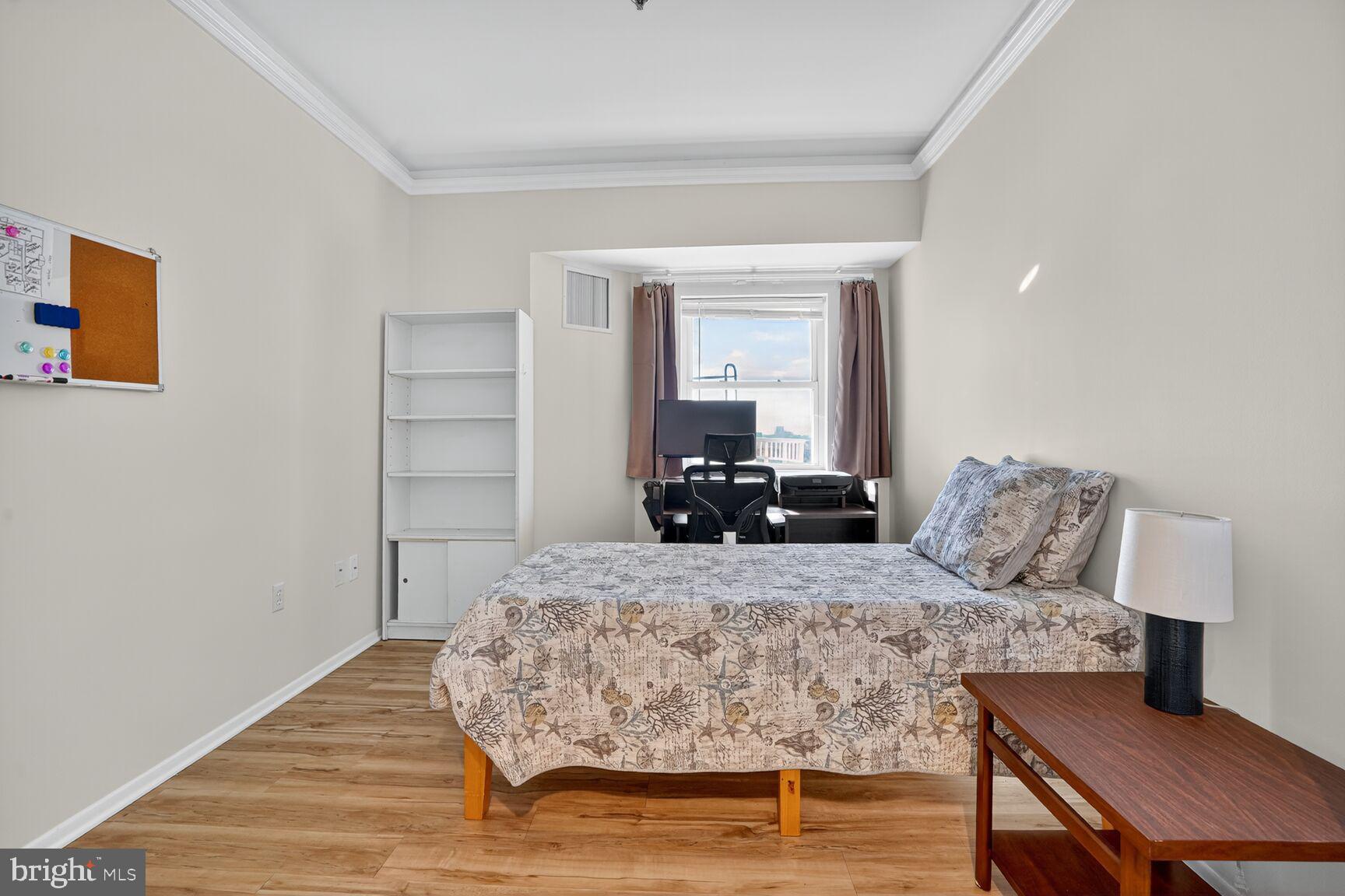 900 North Taylor Street, Unit 2110 Arlington, VA 22203 - Photo 15 of 42 a living room with furniture and a wooden floor