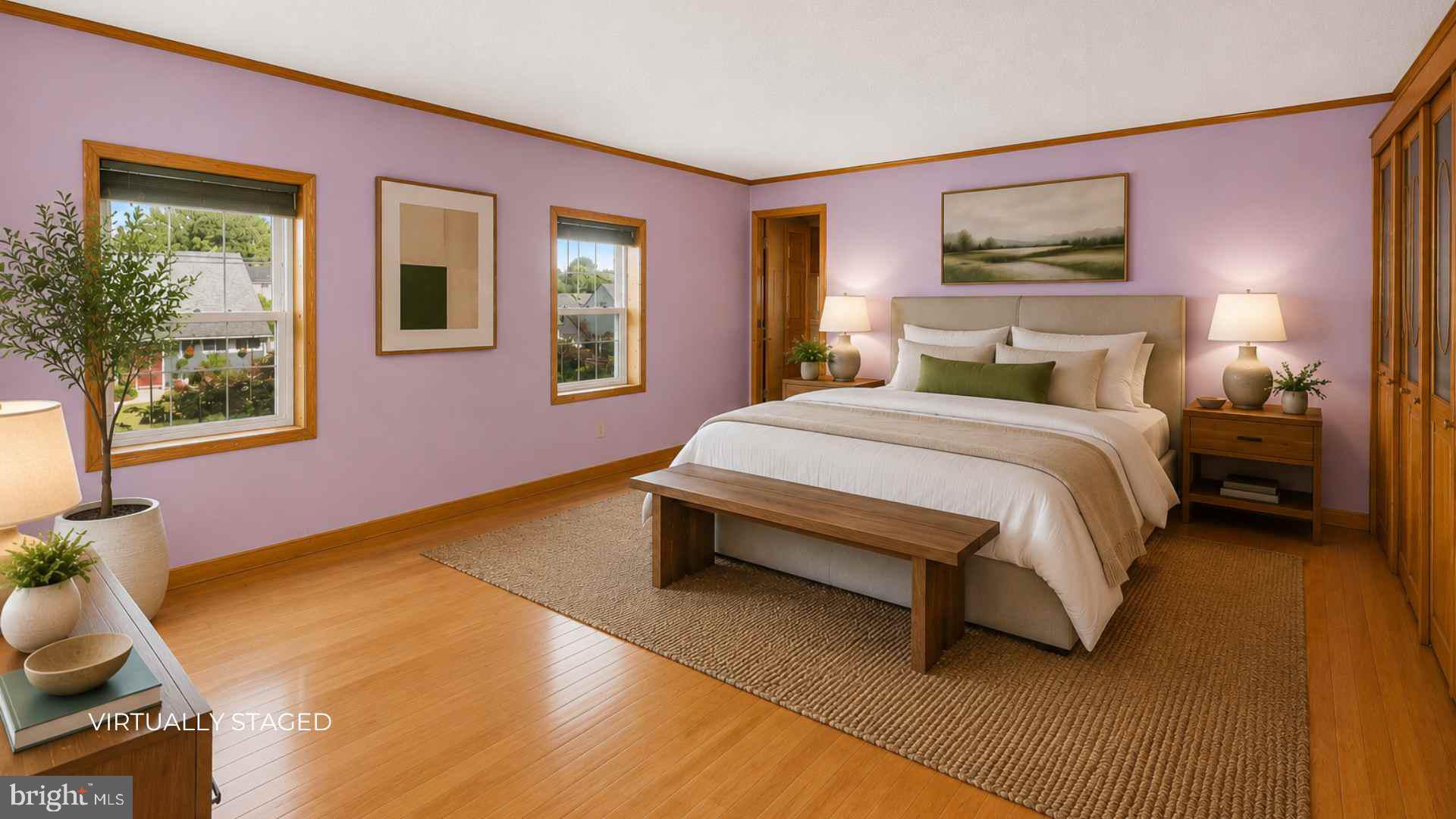 23 Cotton Road Levittown, PA 19057 - Photo 21 of 36 a bedroom with a bed lamp and a potted plant