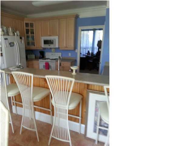 425 Golf Club Drive Santa Rosa Beach, FL 32459 - Photo 22 of 23 a dining room with furniture and a window