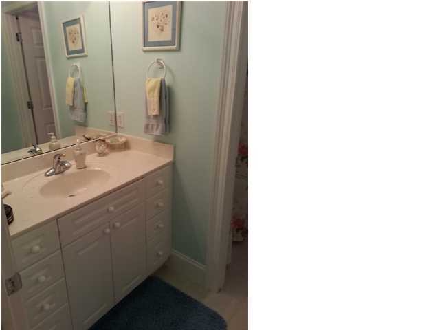 425 Golf Club Drive Santa Rosa Beach, FL 32459 - Photo 9 of 23 a bathroom with a sink and a mirror