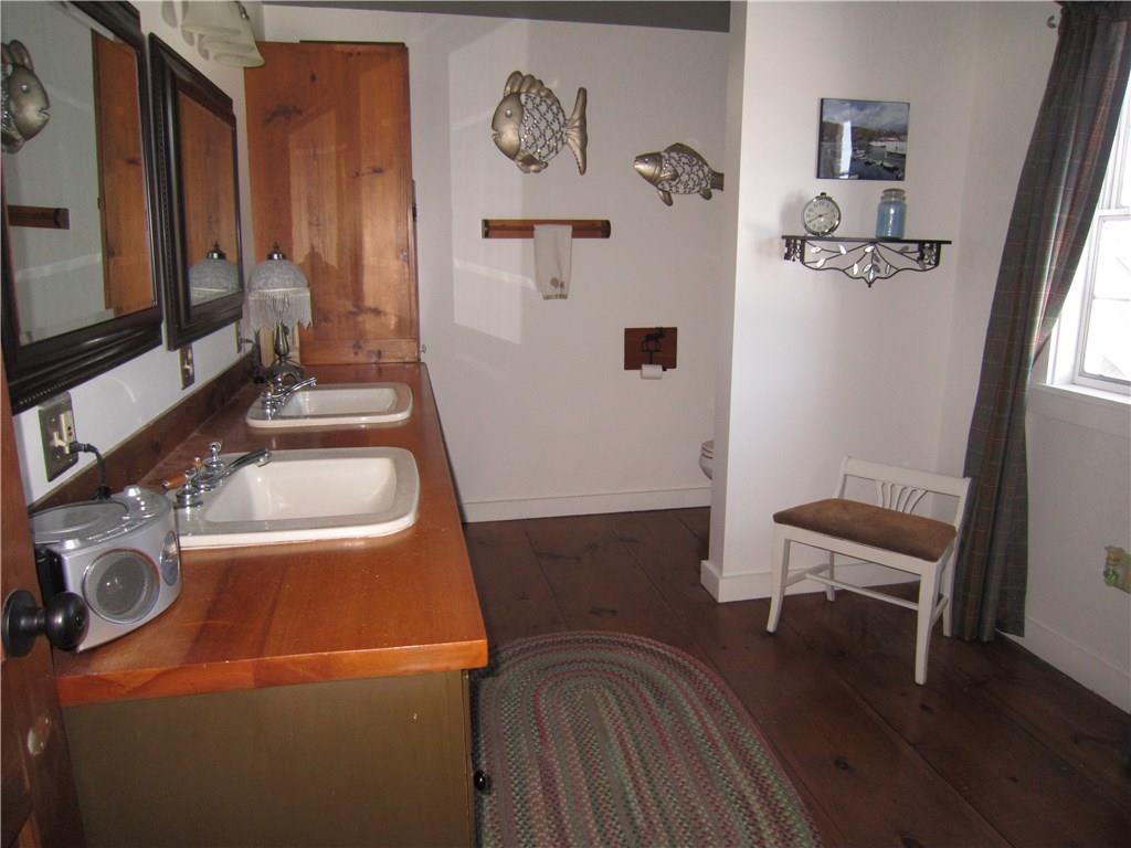 74 Hughes Road Mapleton, ME 04757 - Photo 22 of 33 Double sinks in large second story bath.