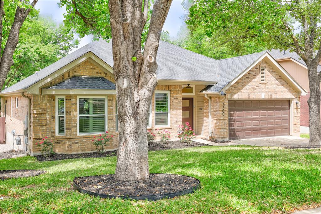 3600 Rip Ford Drive Austin, TX 78732 - Photo 1 of 32 a front view of a house with a yard and trees