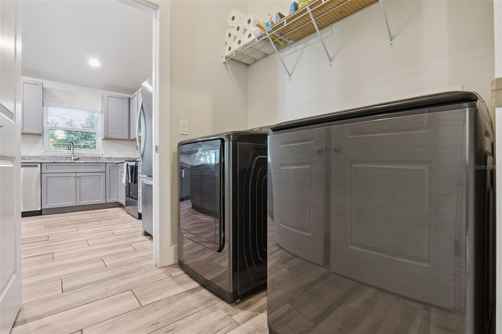 1049 Pinder Street Deltona, FL 32725 - Photo 19 of 20 a bathroom with a shower and a tub