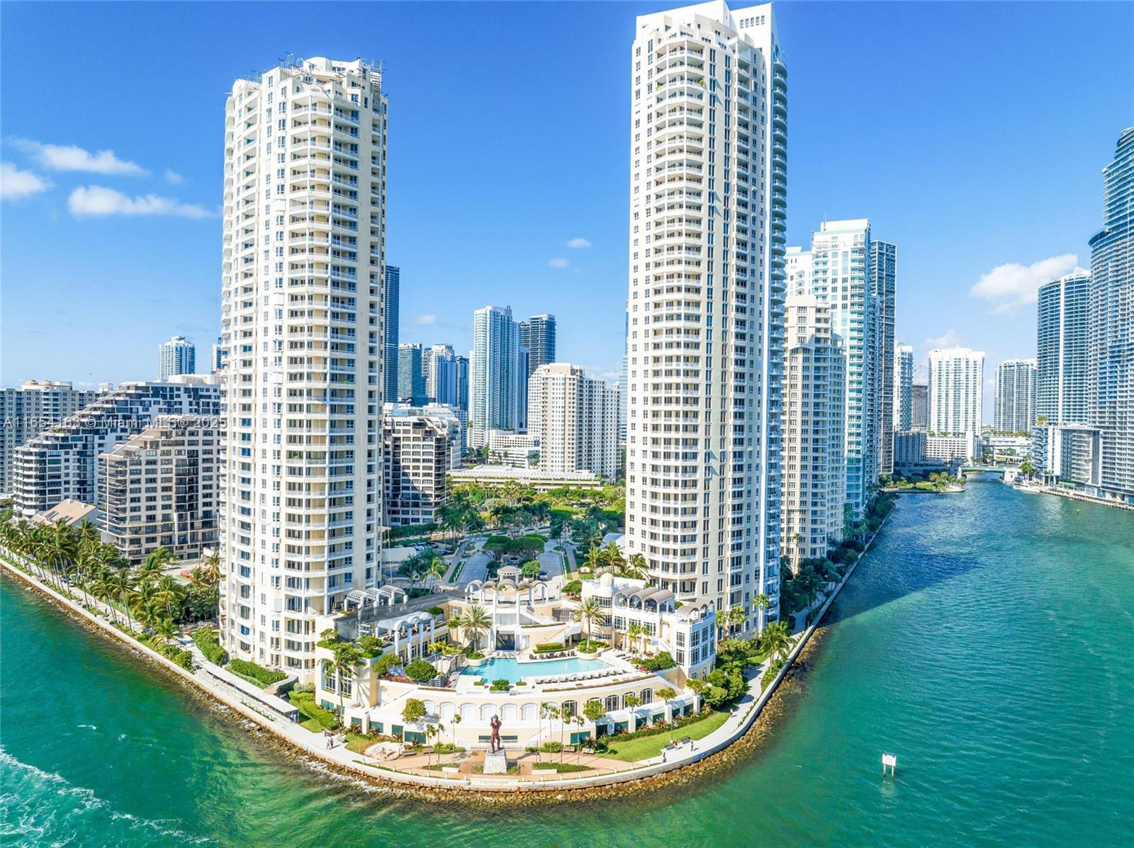 a view of a city with tall buildings