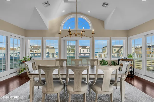 a kitchen with stainless steel appliances granite countertop a stove and a refrigerator