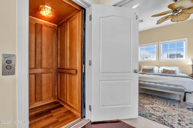 a spacious bathroom with a double vanity sink mirror and a bathtub