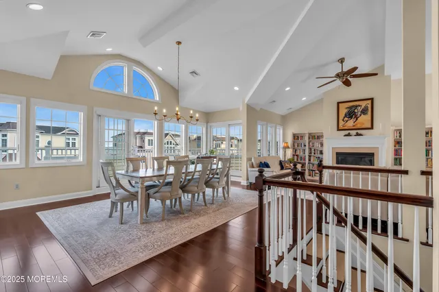 a view of balcony with furniture and a floor to ceiling window