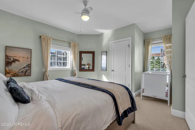 an empty room with furniture and white walls