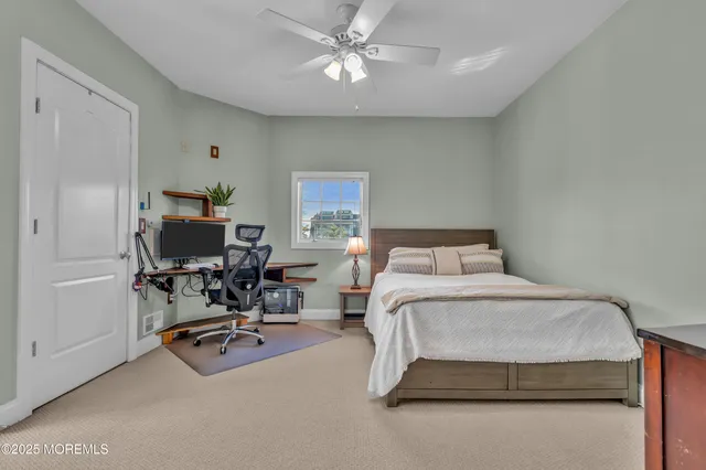a bathroom with a sink toilet and a mirror