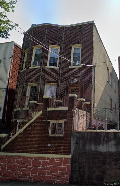 1827 Amethyst Street, Unit 2 Bronx, NY 10462 - Photo 1 of 9 a front view of a house with parking space