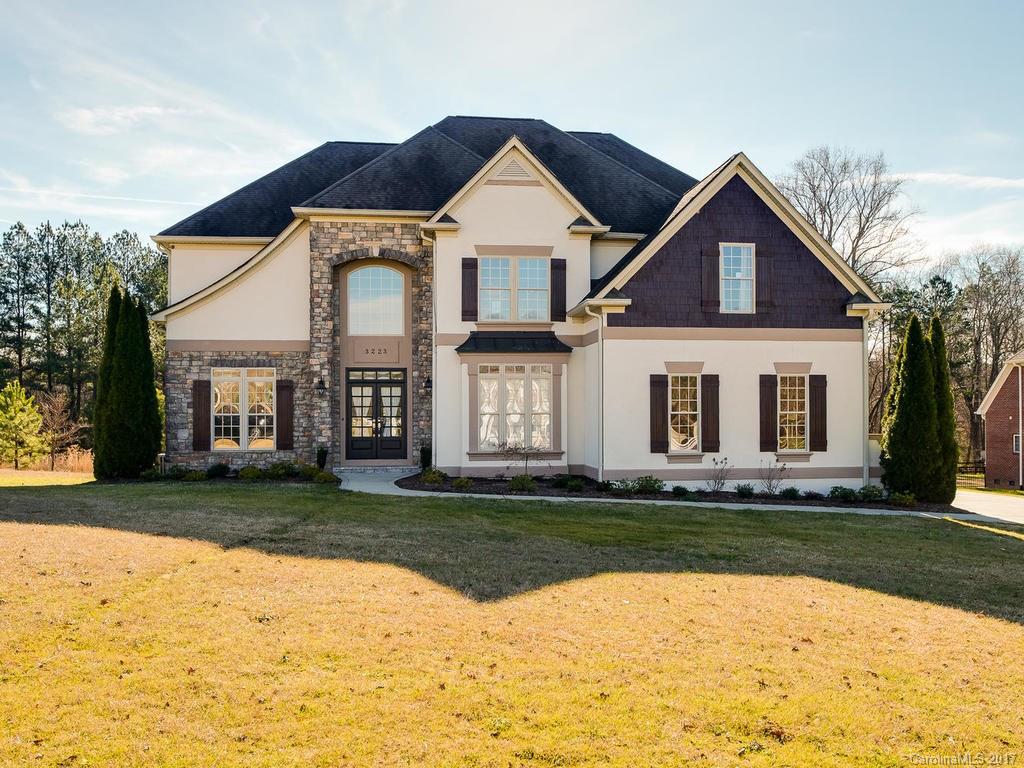 3223 Millstone Creek Road, Unit 2 Lancaster, SC 29720 - Photo 1 of 24 a front view of a house with a yard
