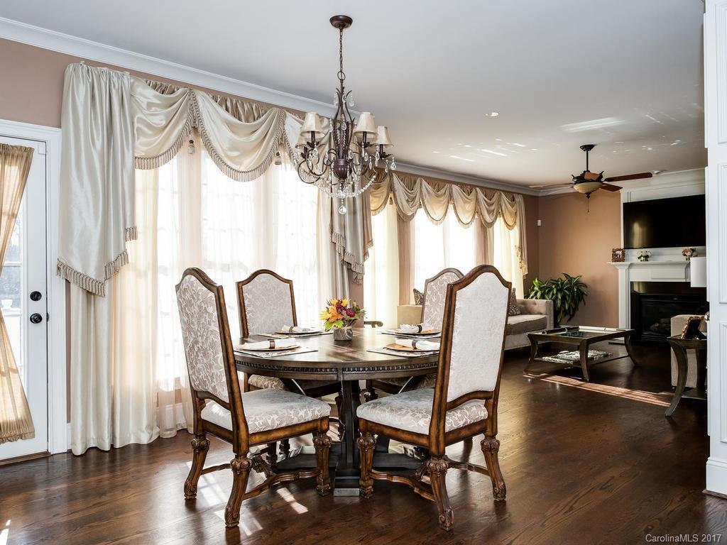 3223 Millstone Creek Road, Unit 2 Lancaster, SC 29720 - Photo 11 of 24 a view of a dining room with furniture window and wooden floor