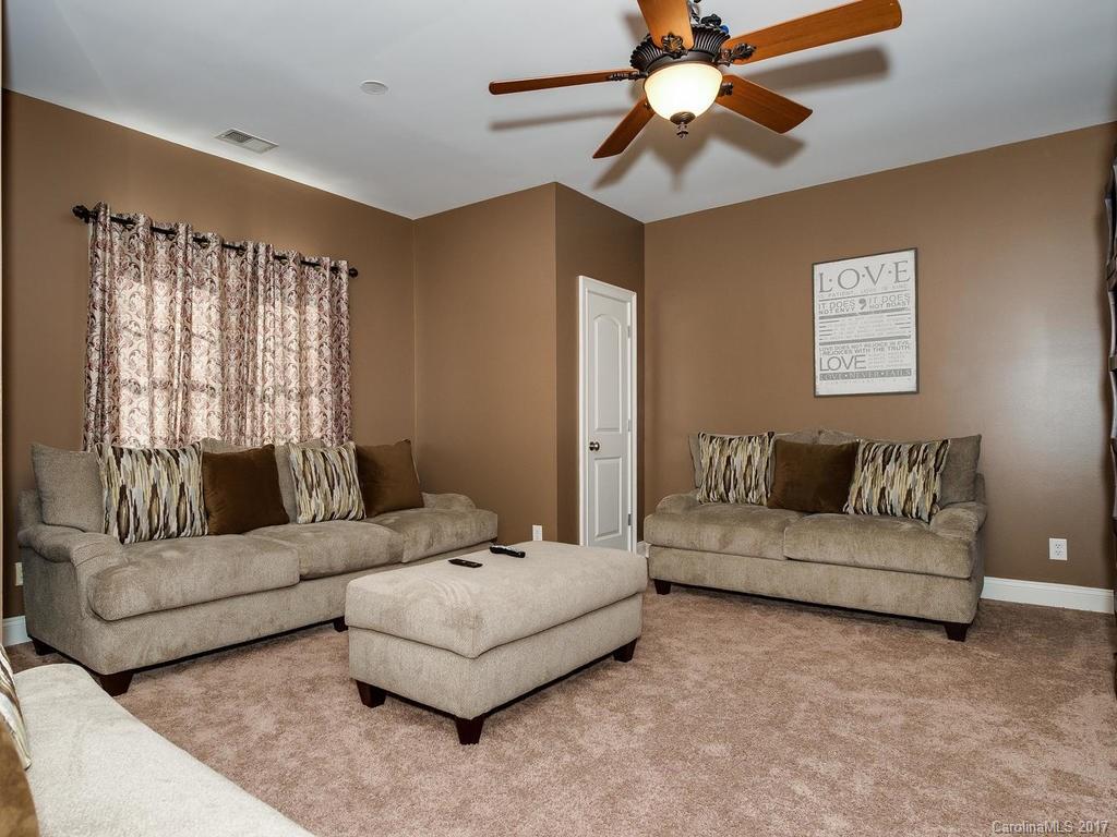 3223 Millstone Creek Road, Unit 2 Lancaster, SC 29720 - Photo 14 of 24 a living room with furniture and a large window