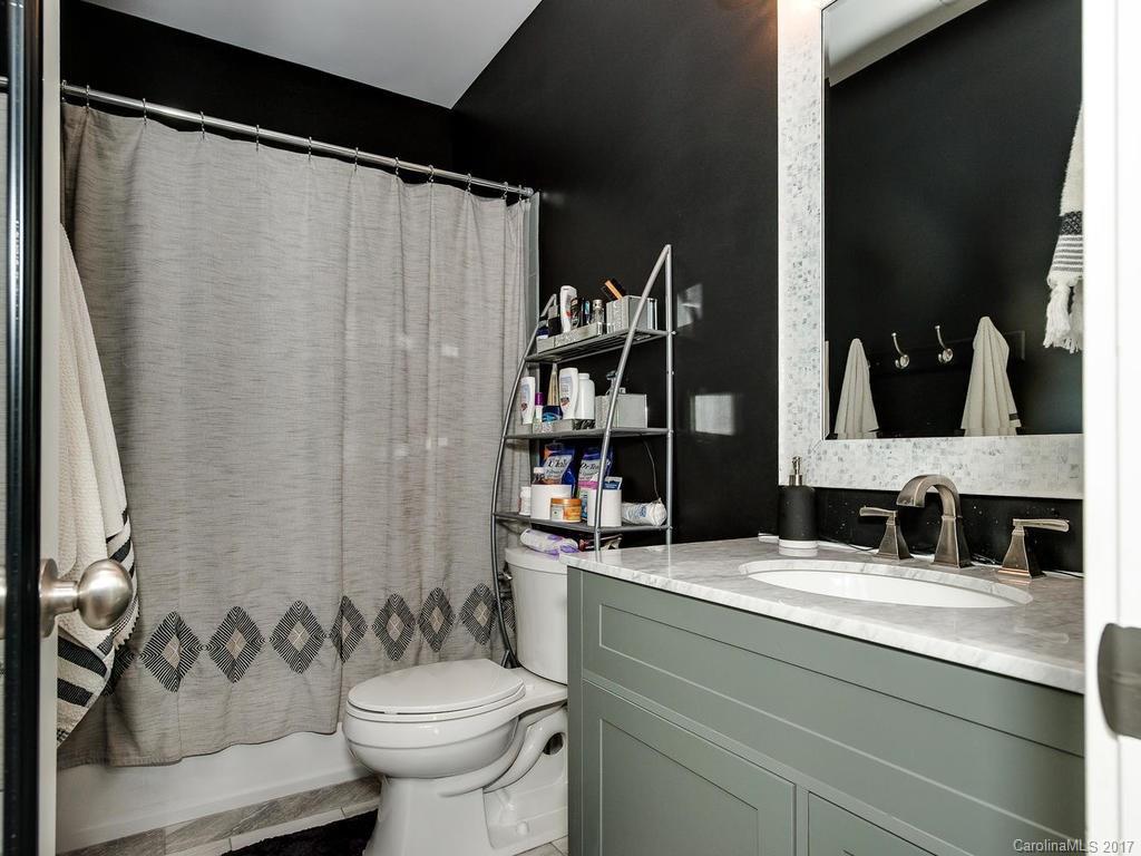 3223 Millstone Creek Road, Unit 2 Lancaster, SC 29720 - Photo 16 of 24 a bathroom with a sink and a mirror