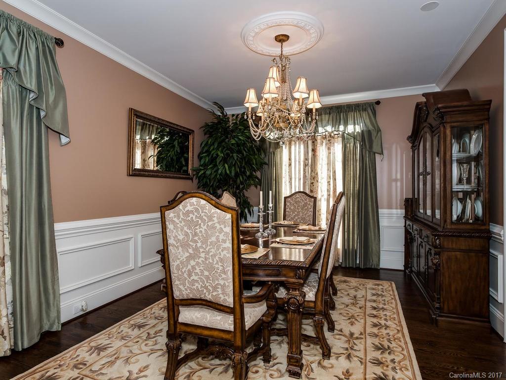 3223 Millstone Creek Road, Unit 2 Lancaster, SC 29720 - Photo 5 of 24 a view of a dining room with furniture and chandelier