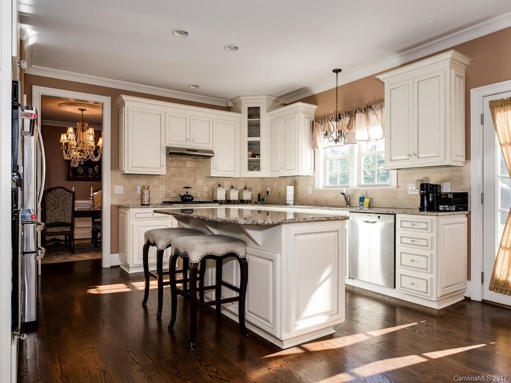 3223 Millstone Creek Road, Unit 2 Lancaster, SC 29720 - Photo 9 of 24 a kitchen with white cabinets and appliances