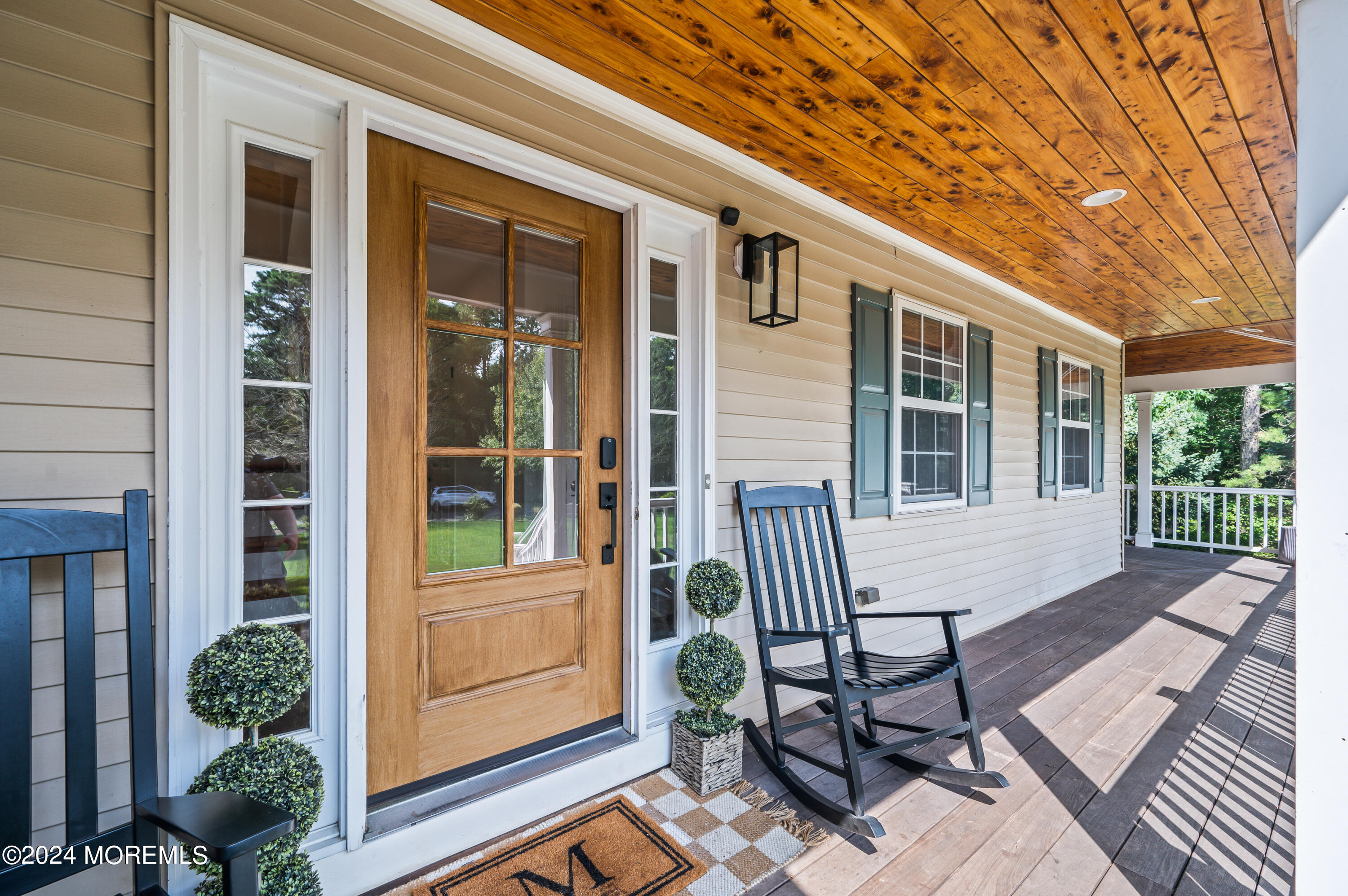 17 Mary Beth Lane Jackson, NJ 08527 - Photo 16 of 61 a view of a porch with furniture and garden