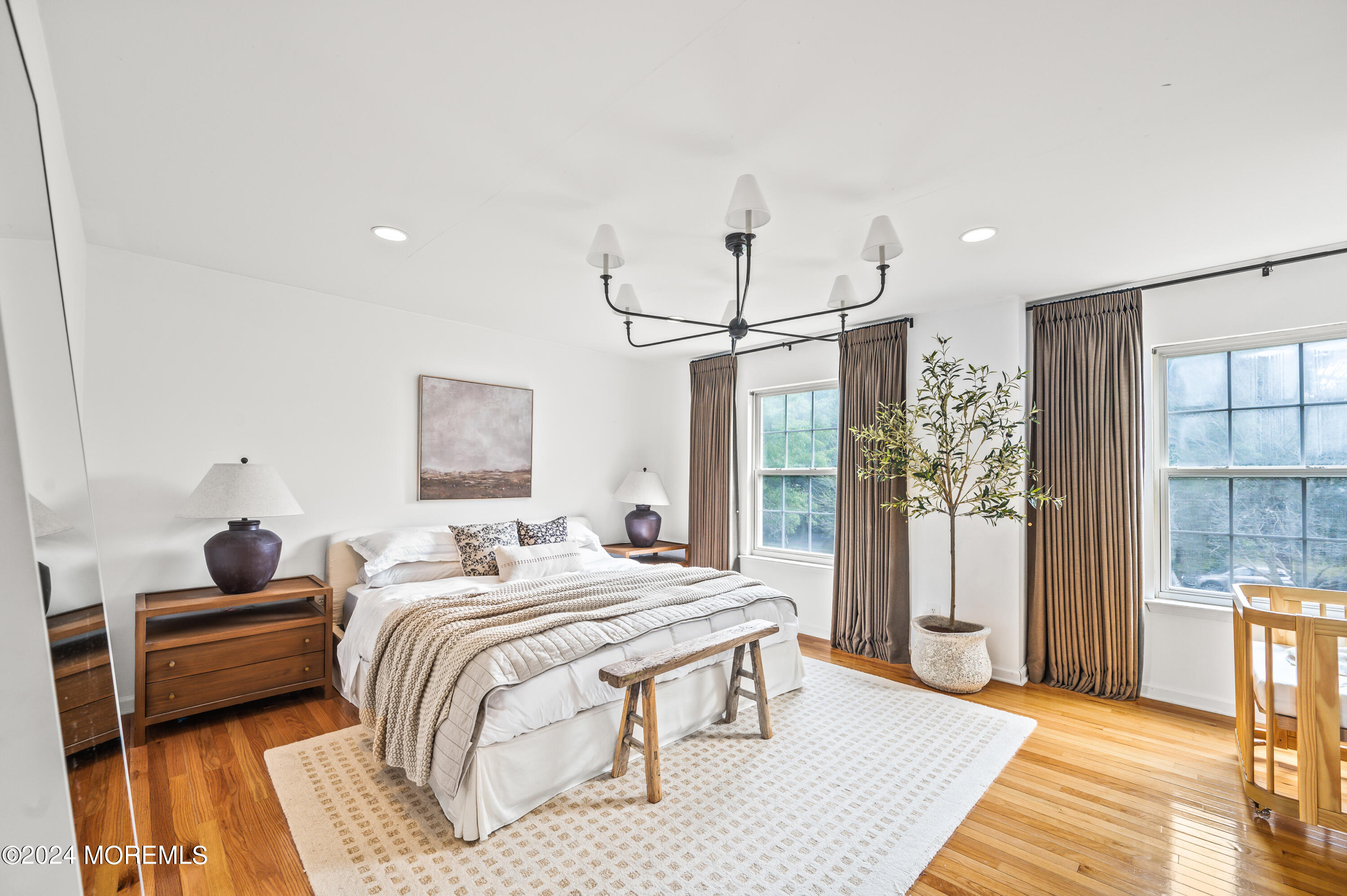 17 Mary Beth Lane Jackson, NJ 08527 - Photo 22 of 61 a bedroom with bed and wooden floor