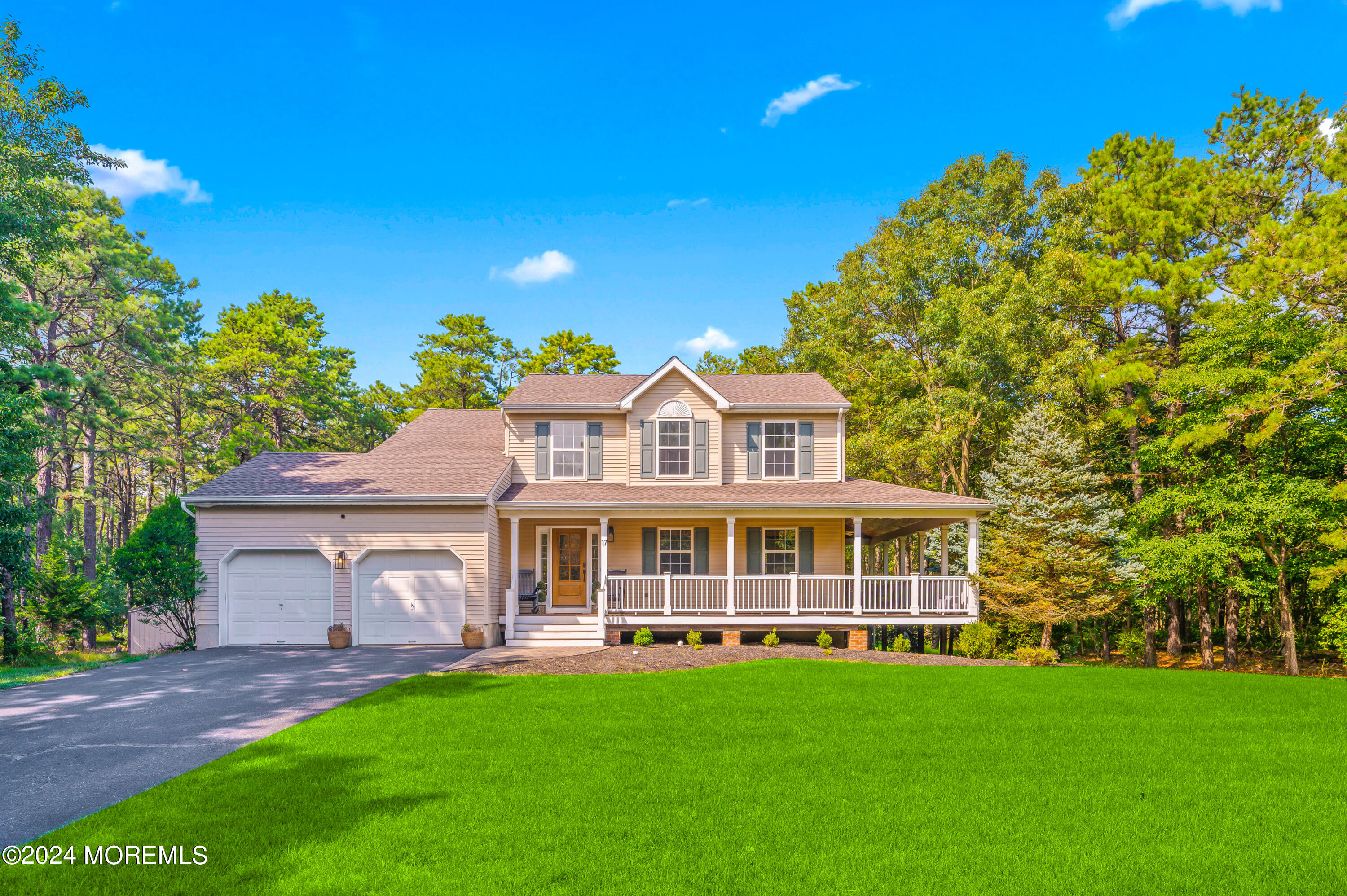 17 Mary Beth Lane Jackson, NJ 08527 - Photo 26 of 61 a front view of a house with a garden