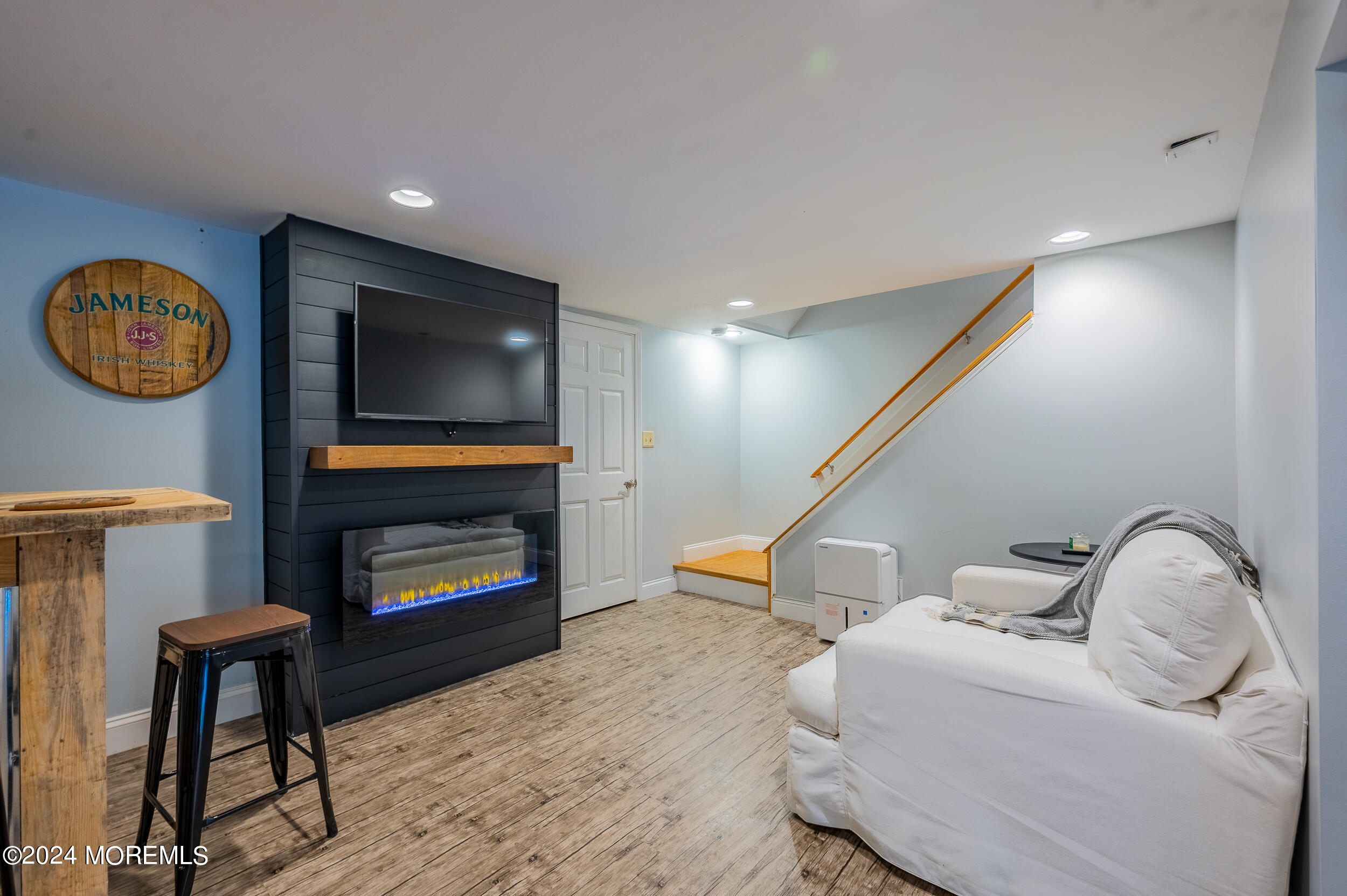 17 Mary Beth Lane Jackson, NJ 08527 - Photo 37 of 61 a bedroom with furniture and a fireplace