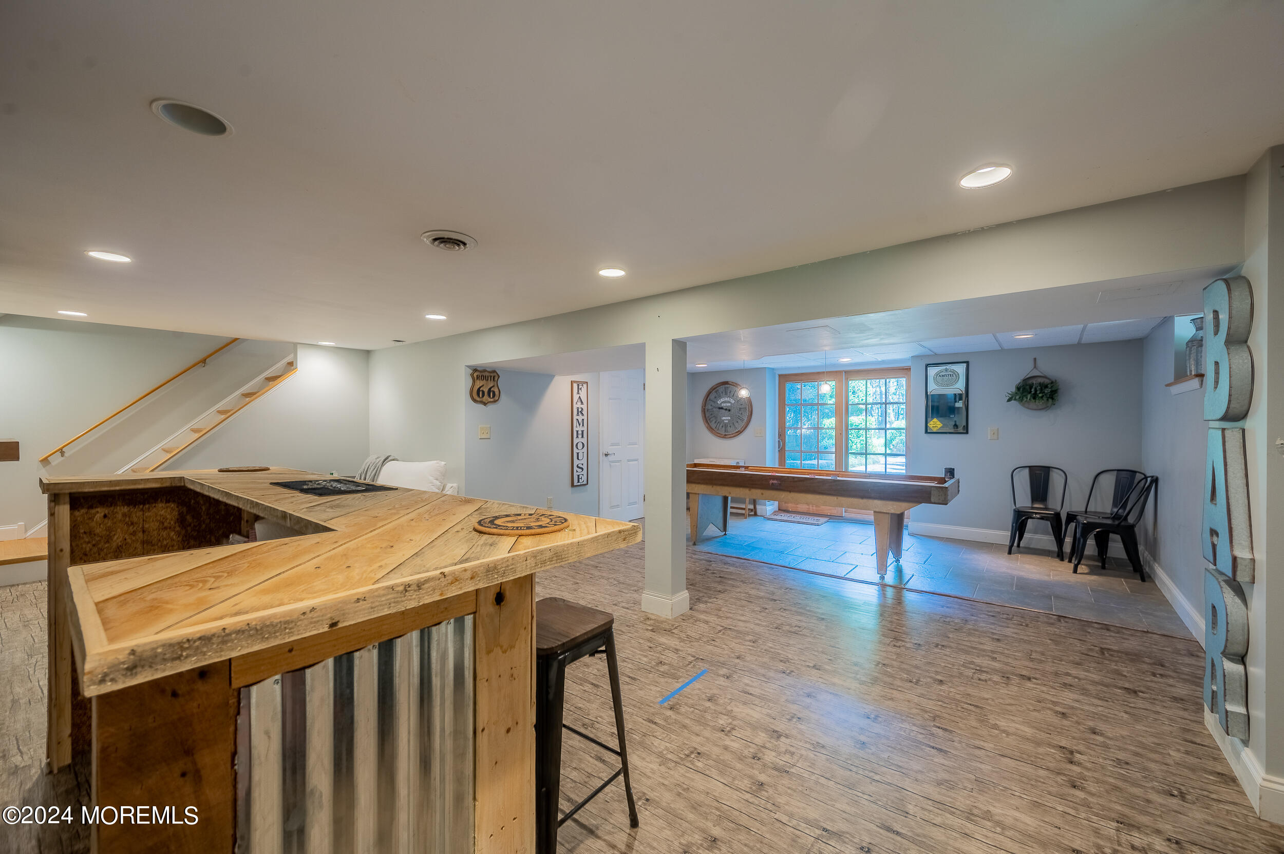 17 Mary Beth Lane Jackson, NJ 08527 - Photo 40 of 61 a room with furniture and a wooden floor