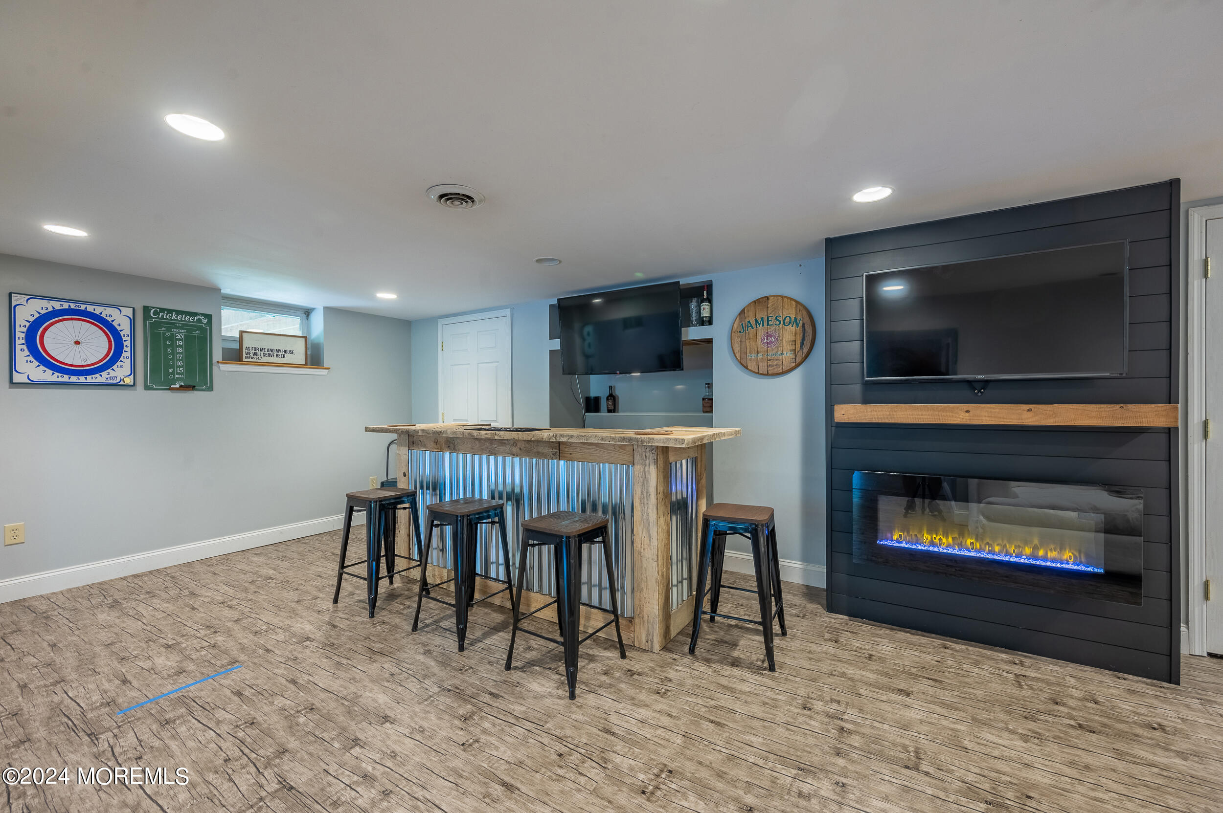 17 Mary Beth Lane Jackson, NJ 08527 - Photo 42 of 61 a living room with furniture and a fireplace