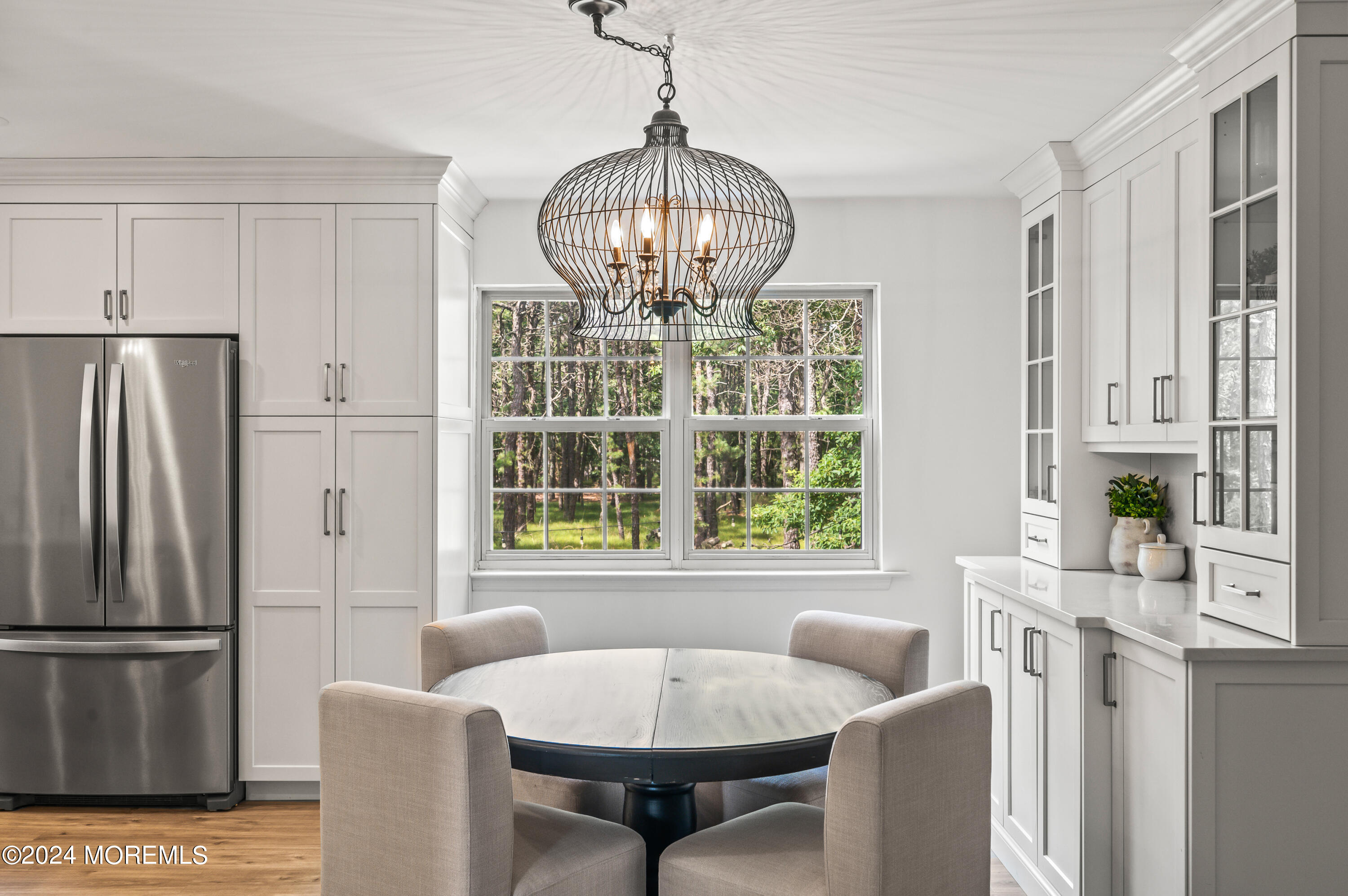 17 Mary Beth Lane Jackson, NJ 08527 - Photo 9 of 61 a dining room with furniture a chandelier and window
