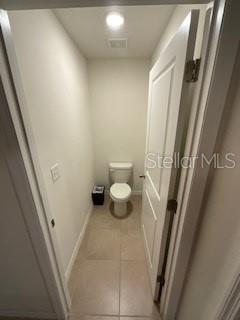 5911 Southwest 84th Street Gainesville, FL 32608 - Photo 13 of 30 a bathroom with a sink and a vanity