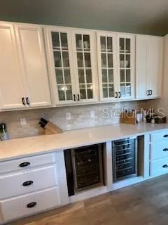 a kitchen with a sink and a window
