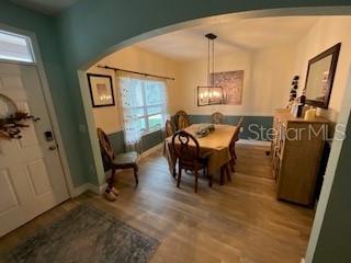 5911 Southwest 84th Street Gainesville, FL 32608 - Photo 7 of 30 a dining room with furniture and window