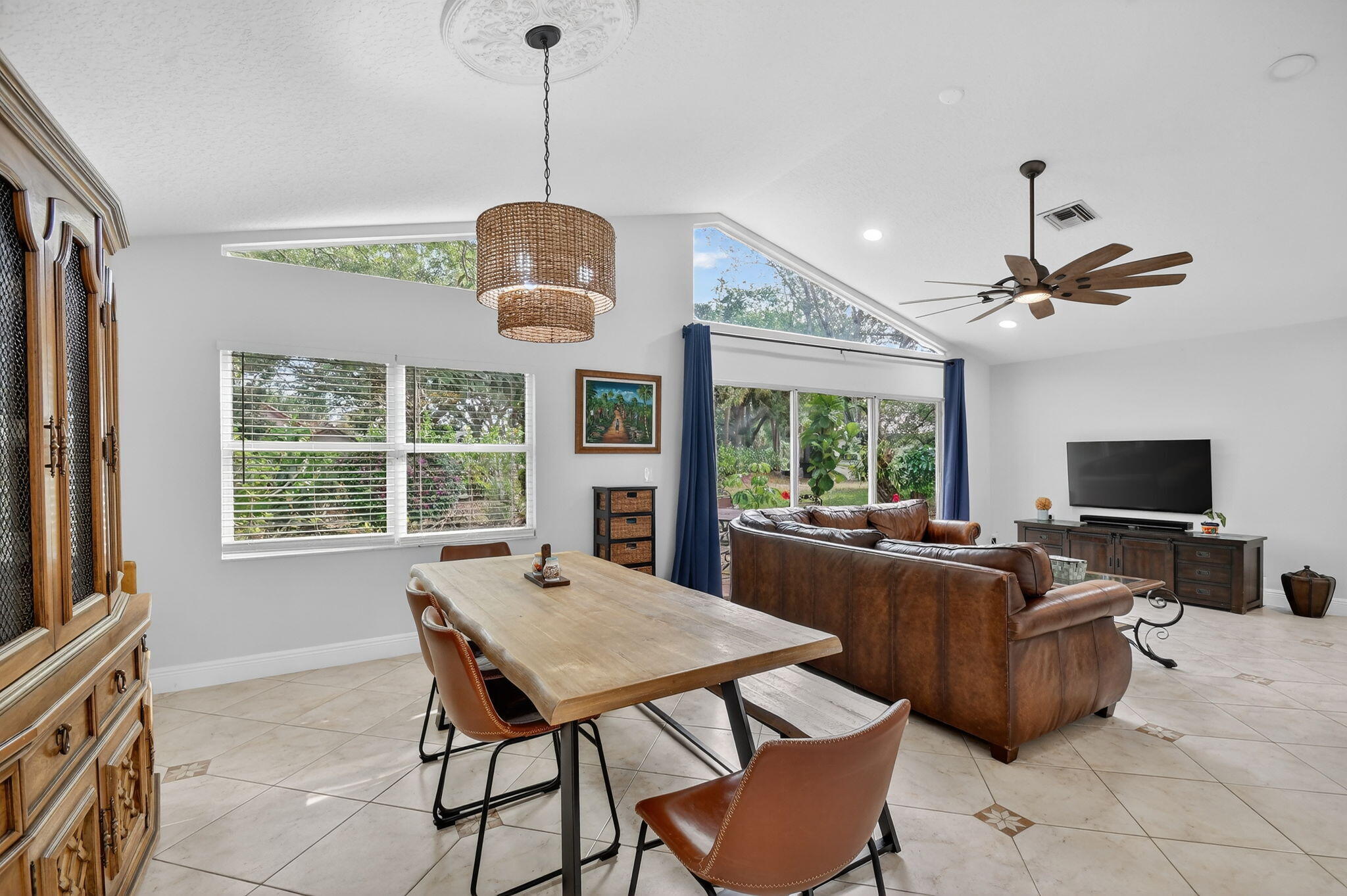 2769 Pointe Circle Greenacres, FL 33413 - Photo 13 of 48 a view of a dining room with furniture window and outside view