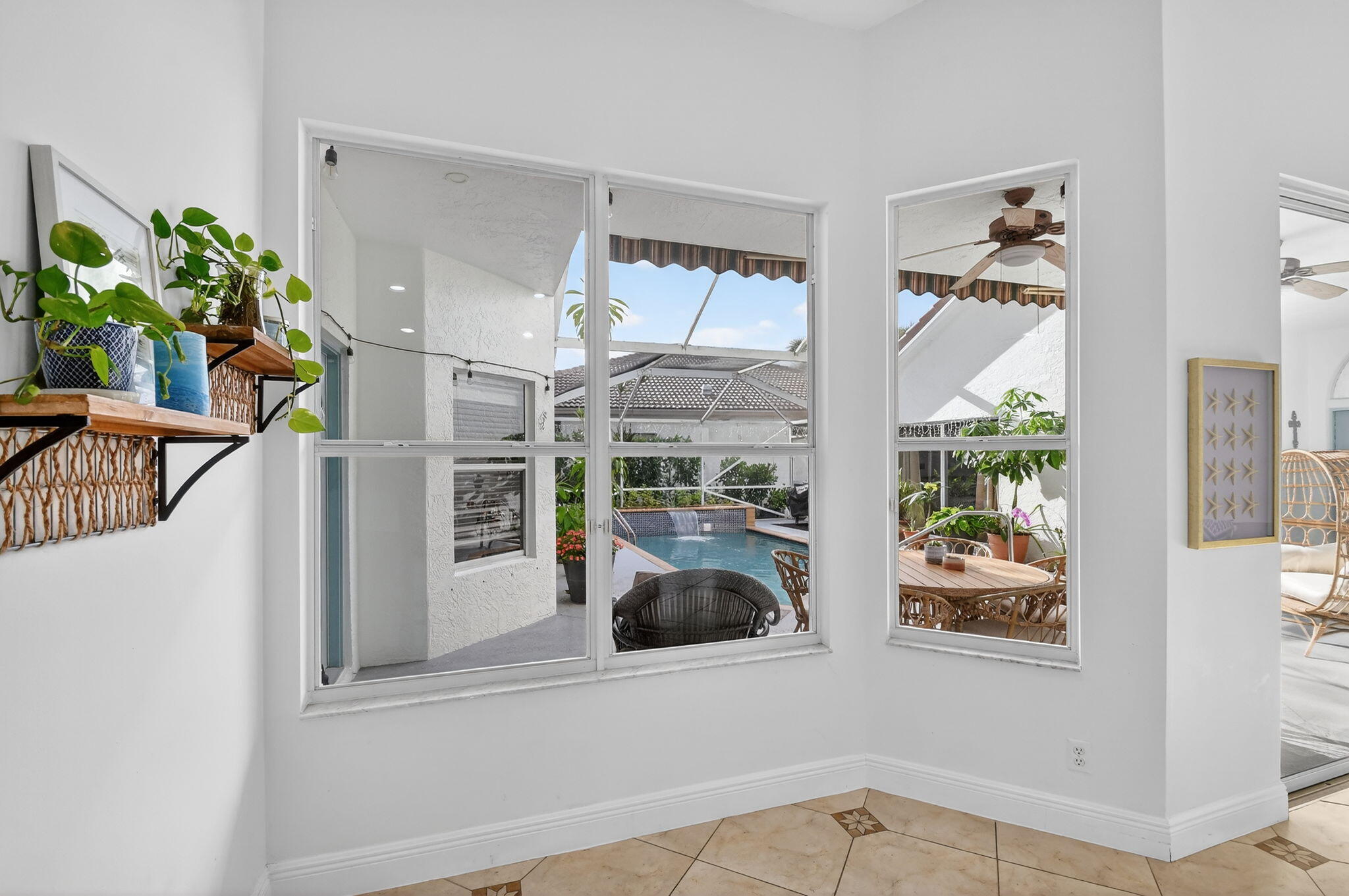 2769 Pointe Circle Greenacres, FL 33413 - Photo 17 of 48 a view of front door and porch