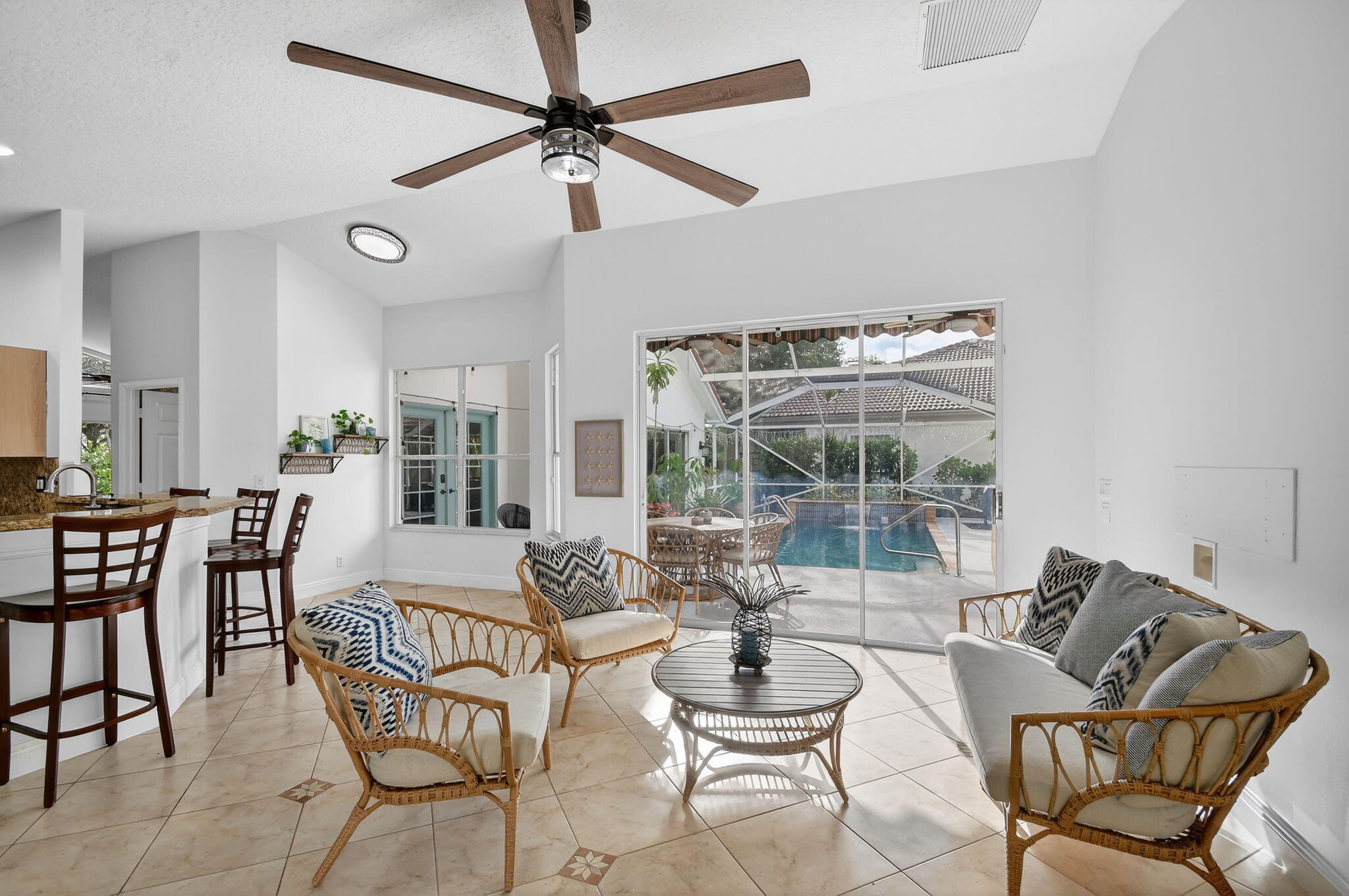 2769 Pointe Circle Greenacres, FL 33413 - Photo 20 of 48 a view of a dining room with furniture window and outside view