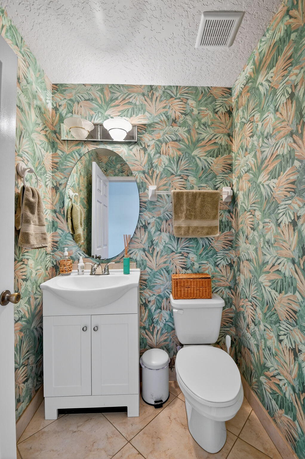 2769 Pointe Circle Greenacres, FL 33413 - Photo 31 of 48 a bathroom with a toilet sink and mirror