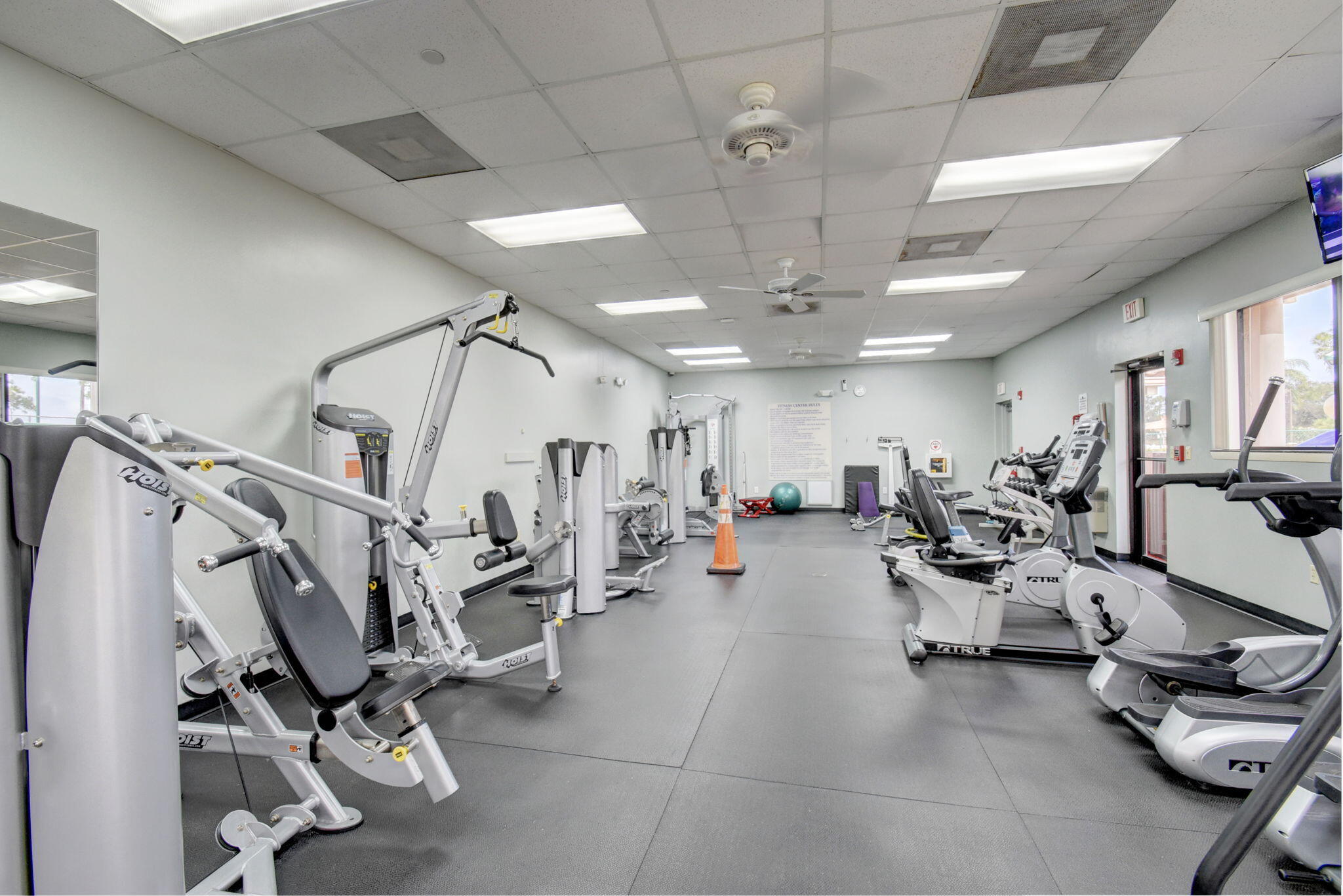 2769 Pointe Circle Greenacres, FL 33413 - Photo 39 of 48 a view of a room with gym equipment
