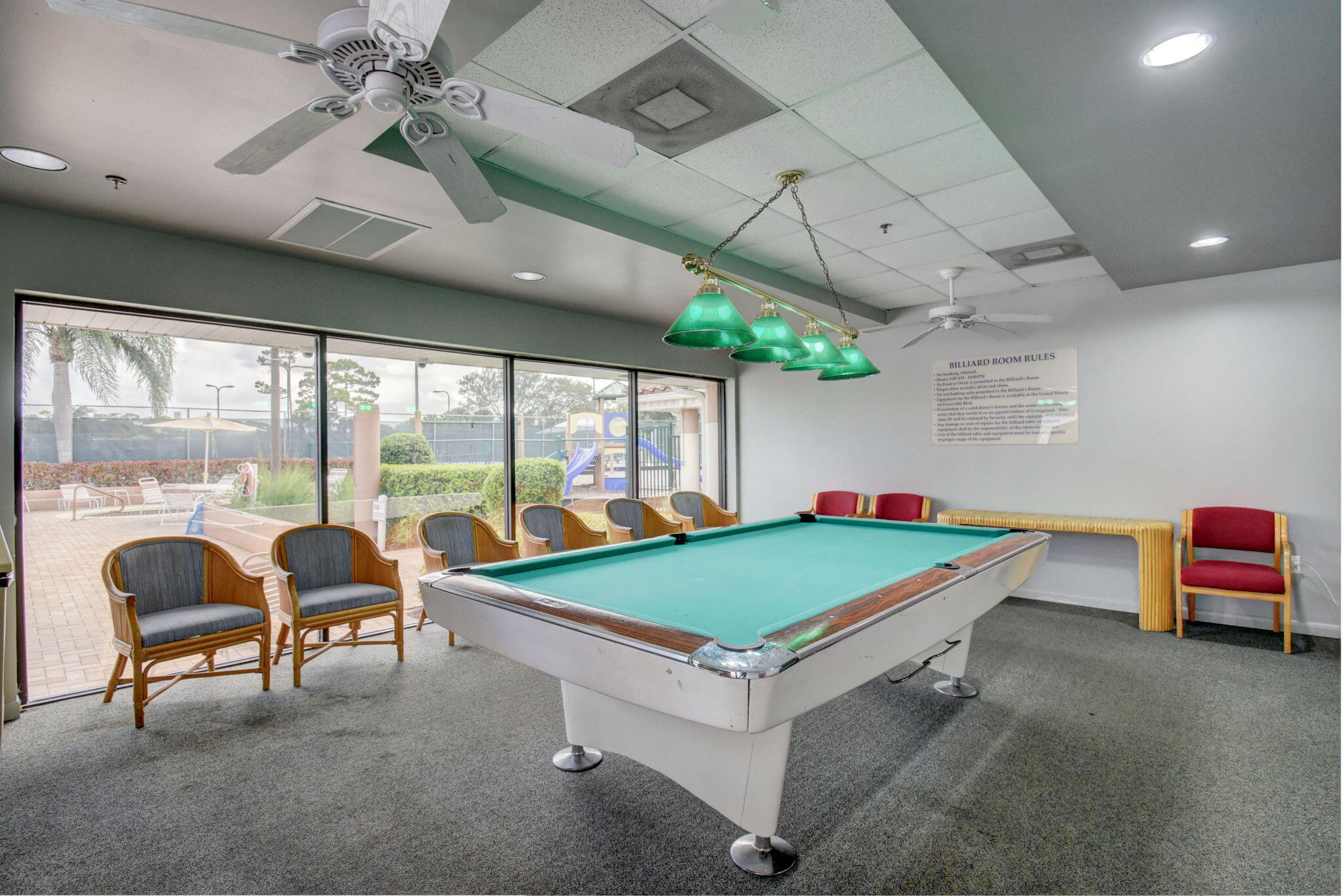 2769 Pointe Circle Greenacres, FL 33413 - Photo 47 of 48 a room with pool table and windows
