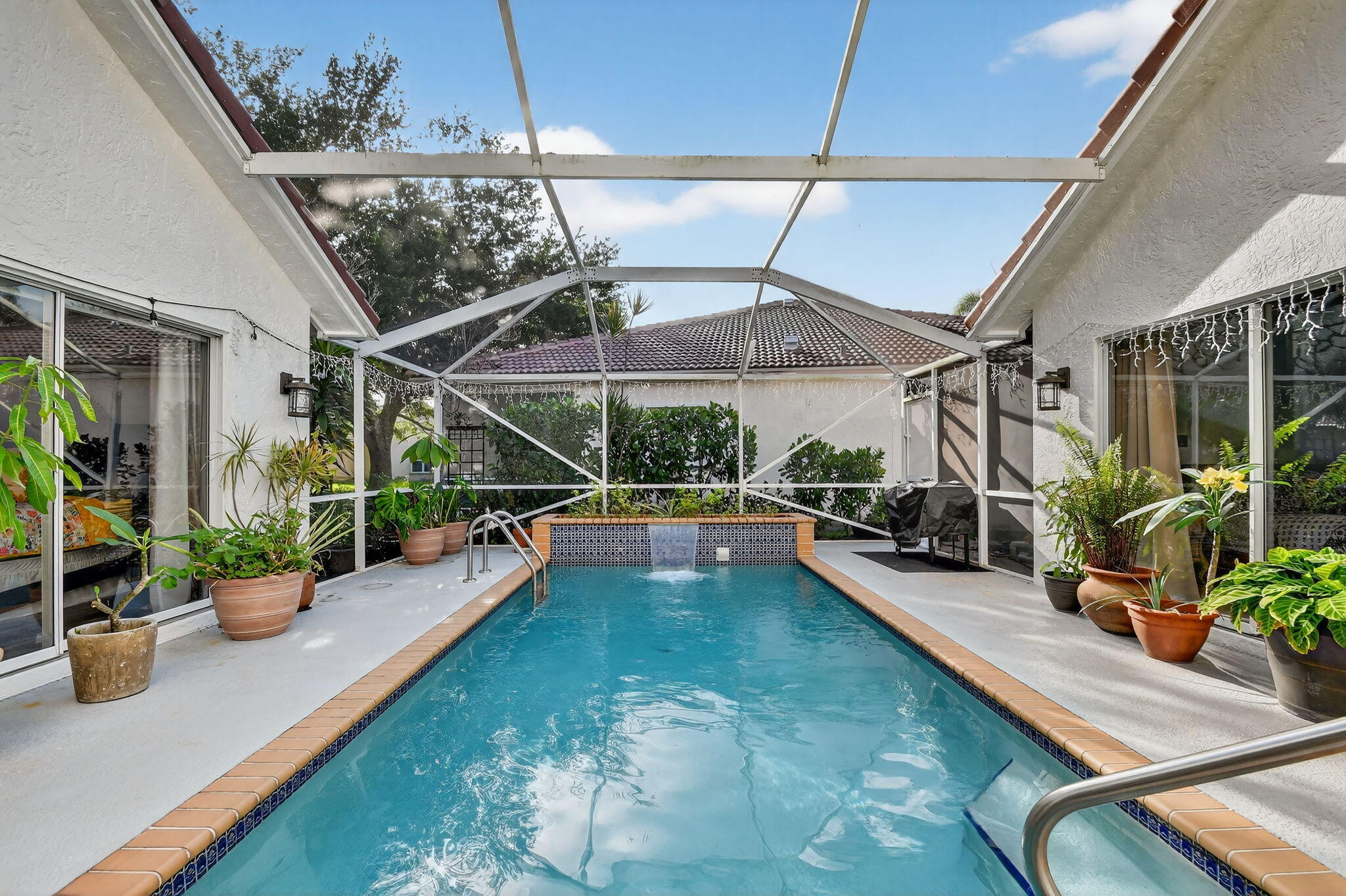 2769 Pointe Circle Greenacres, FL 33413 - Photo 6 of 48 a view of a patio with swimming pool