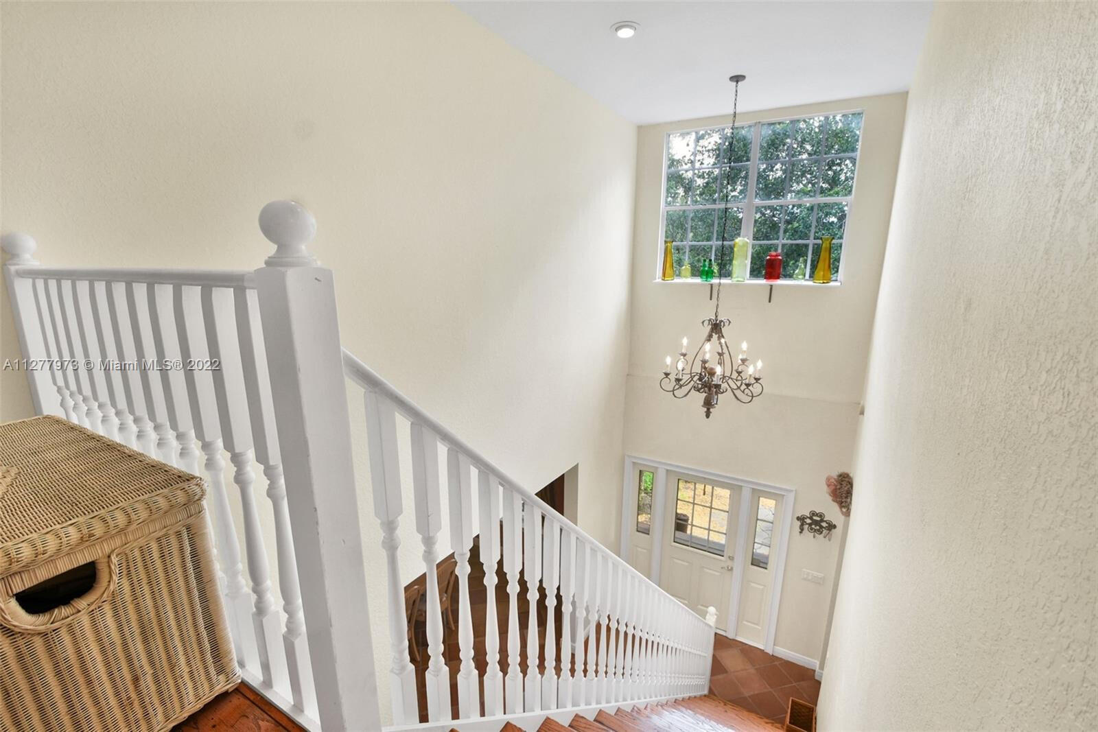 14425 North 64th Court North Loxahatchee, FL 33470 - Photo 26 of 36 a view of entryway with stairs