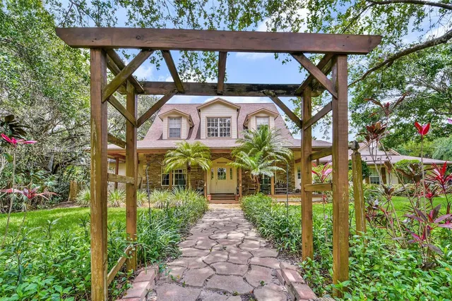 a front view of a house with a porch