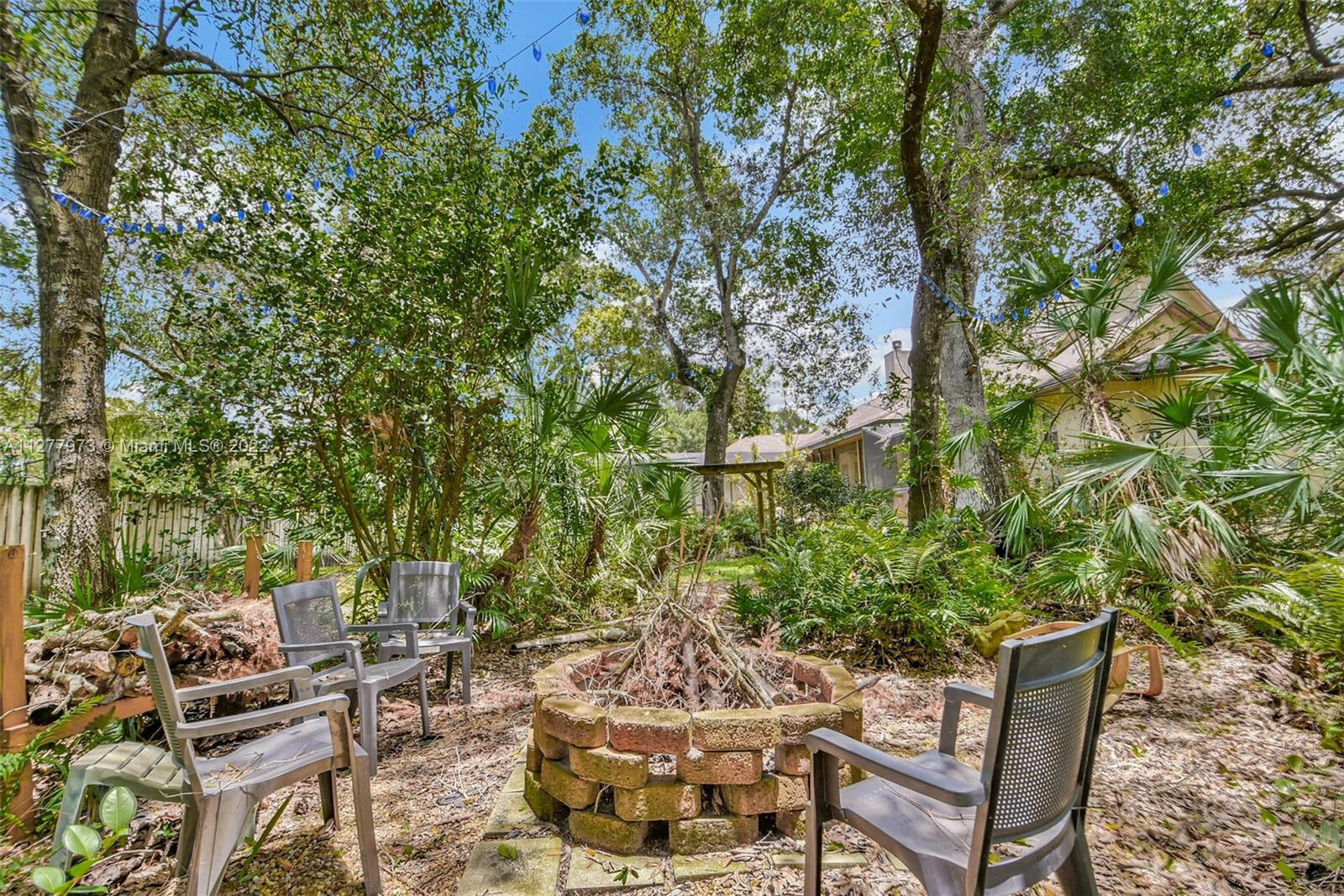 14425 North 64th Court North Loxahatchee, FL 33470 - Photo 34 of 36 a view of outdoor space yard and patio