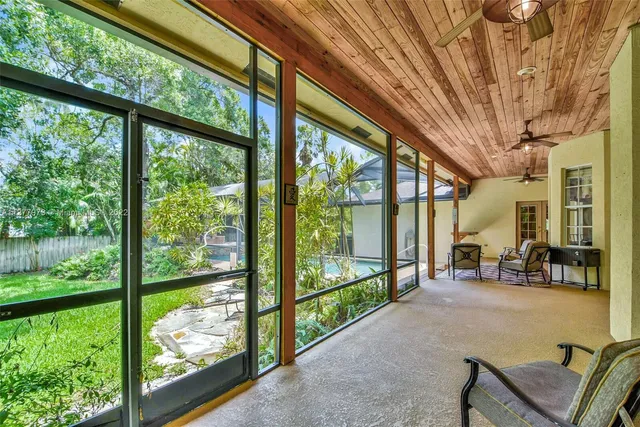 a living room with hardwood area