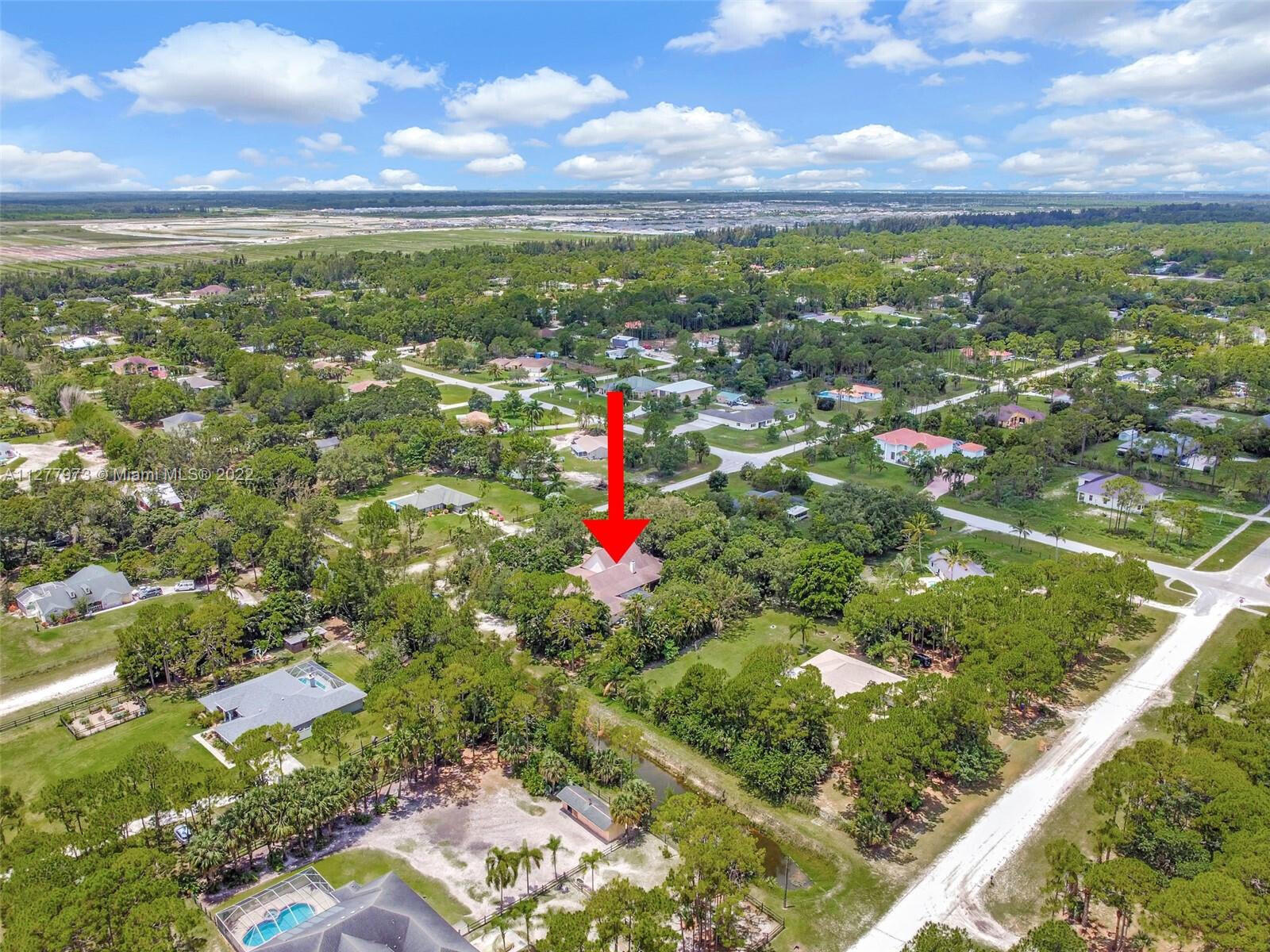 14425 North 64th Court North Loxahatchee, FL 33470 - Photo 6 of 36 a view of a city