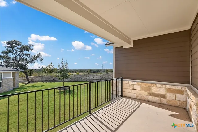 a front view of a house with yard