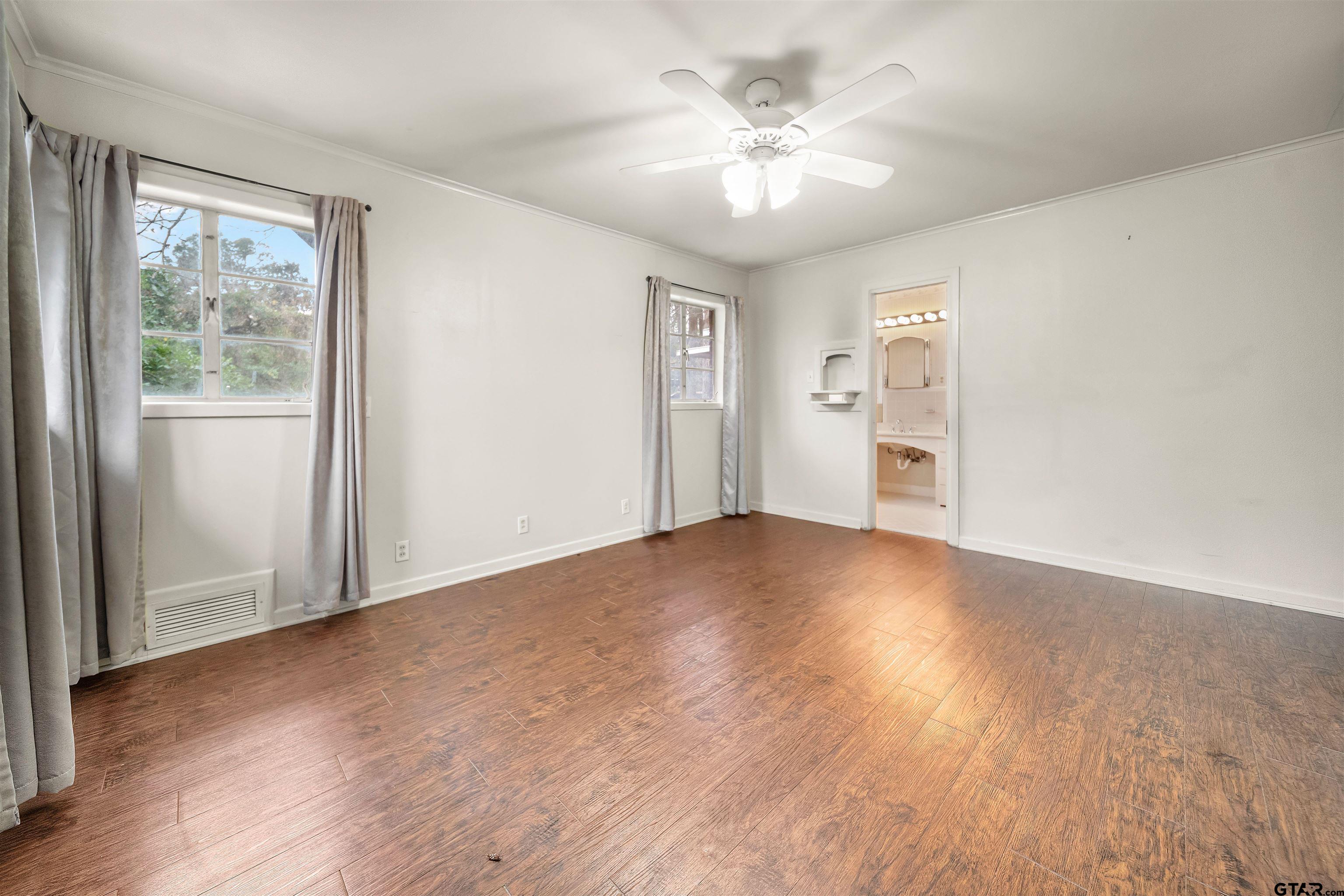 2521 Pounds Tyler, TX 75701 - Photo 15 of 40 a view of empty room with wooden floor and fan